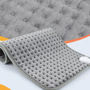 Termoterapia com manta térmica para relaxamento muscular em casa