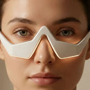Aparelho massageador com microcorrente EMS para cuidado da região dos olhos